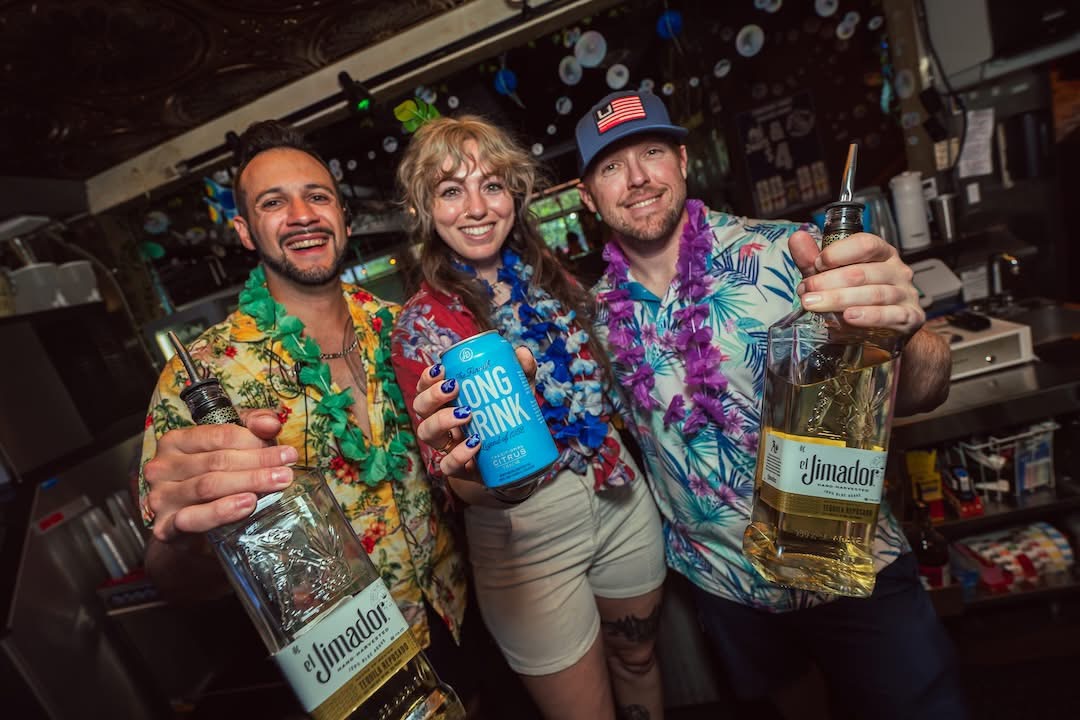 Group of guests in Hawaiian shirts at Hookava during a Crawl Reno event