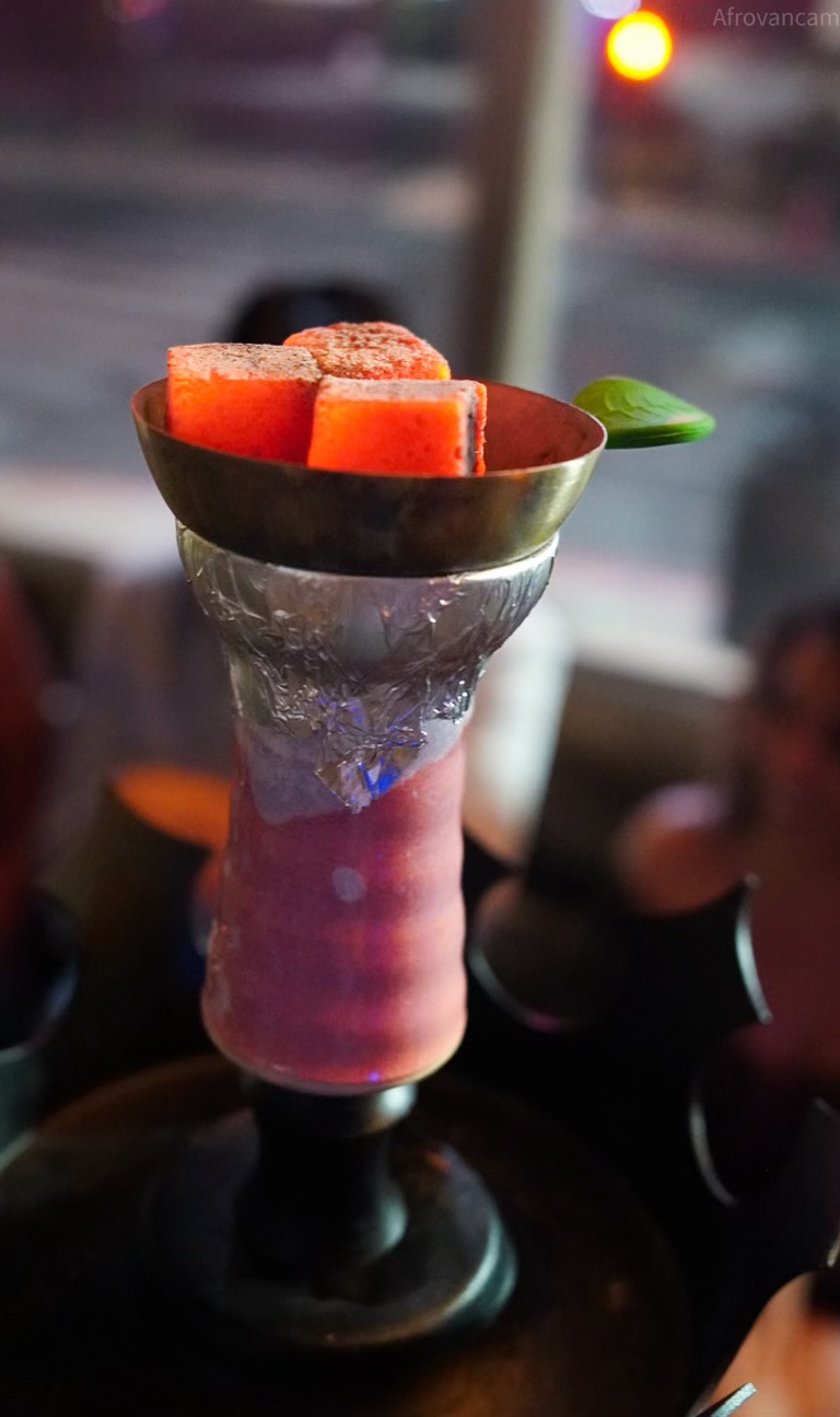 Close-up of a glowing hookah bowl with hot coals at Hookava